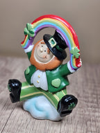 Saint Patricks Day Ceramic Leprechaun Holding Rainbow Figurine