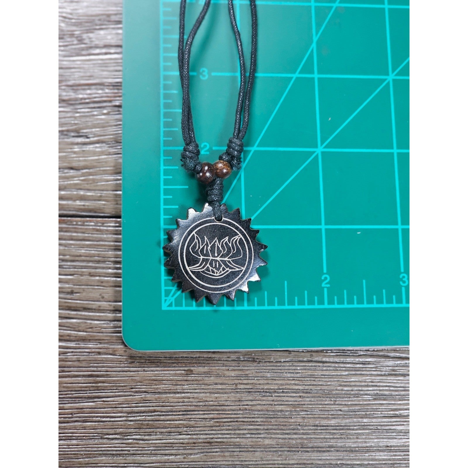 Vintage Carved Black Pendant Necklace Sunburst Lotus Design