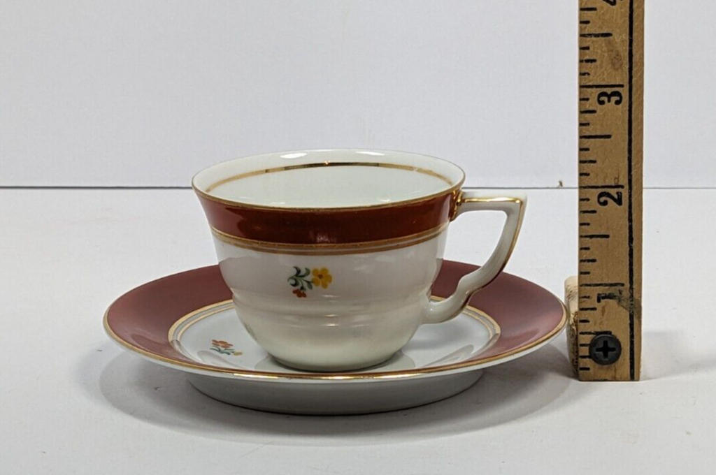 Floral Design Condol Saucer And Tea Cup With Gold Trim
