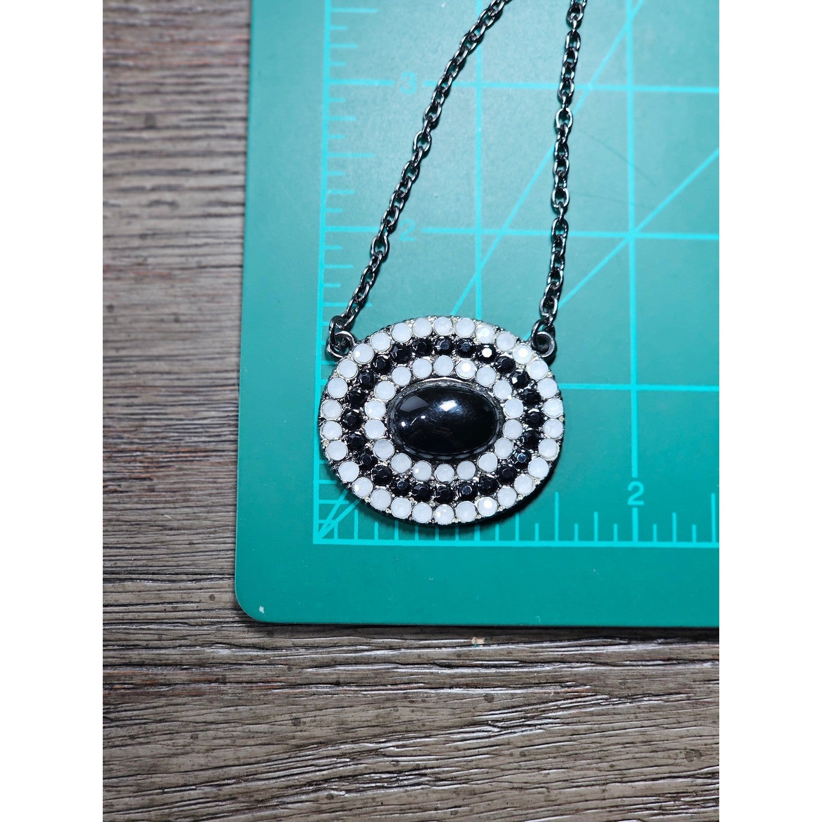 Vintage Black Oval Pendant Necklace with Rhinestone Halo on Gunmetal Chain