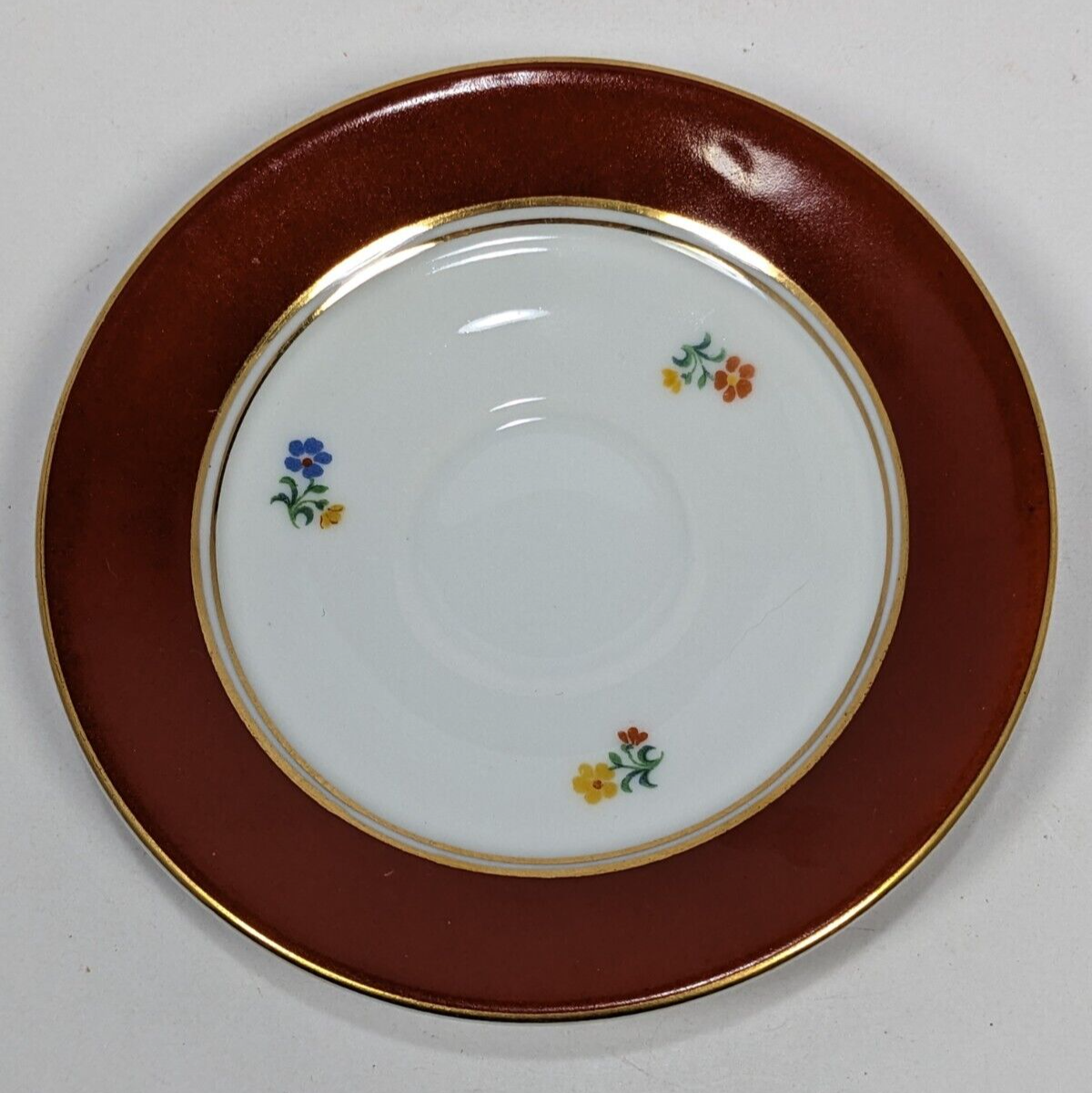 Floral Design Condol Saucer And Tea Cup With Gold Trim