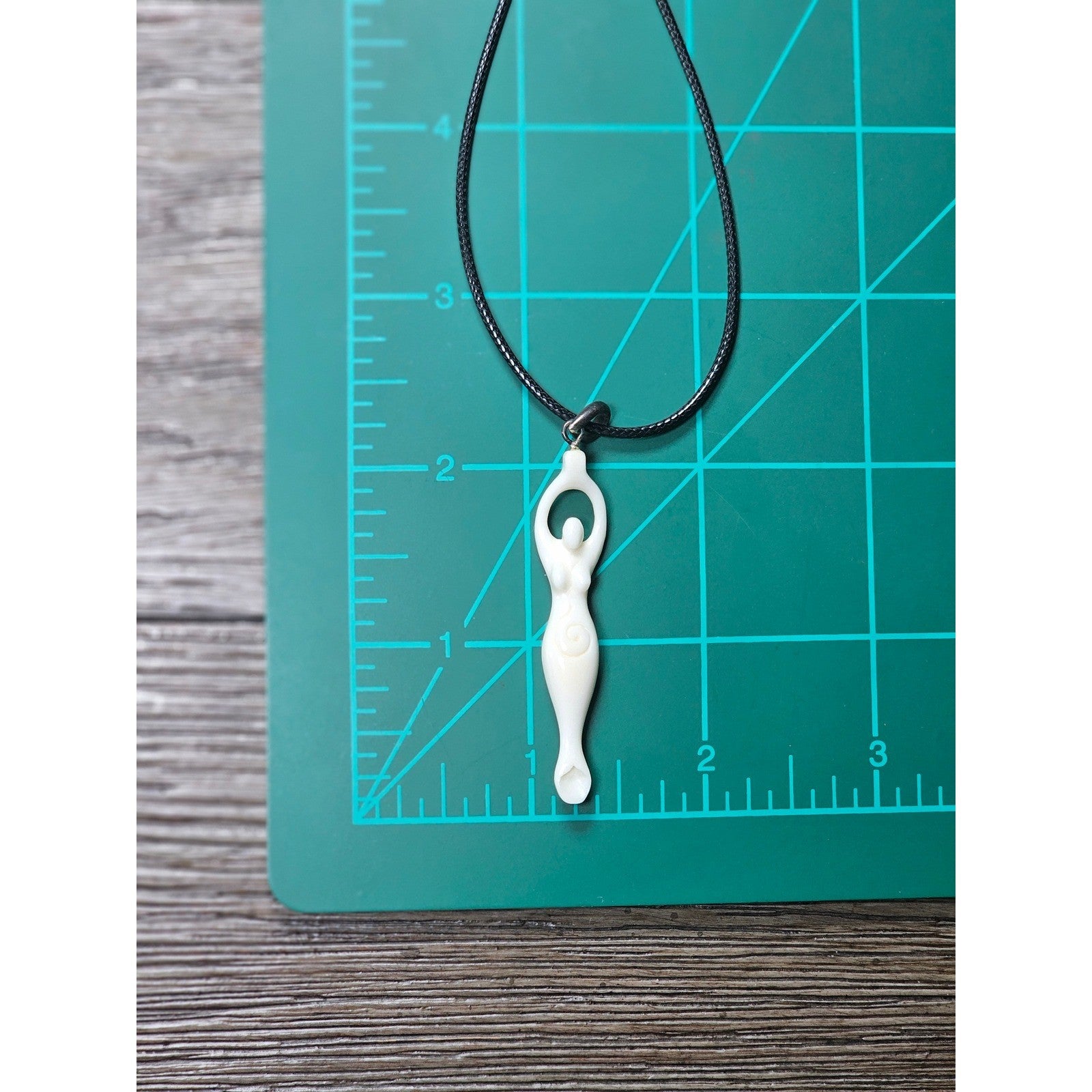 Vintage Carved Goddess Pendant Necklace on Black Cord