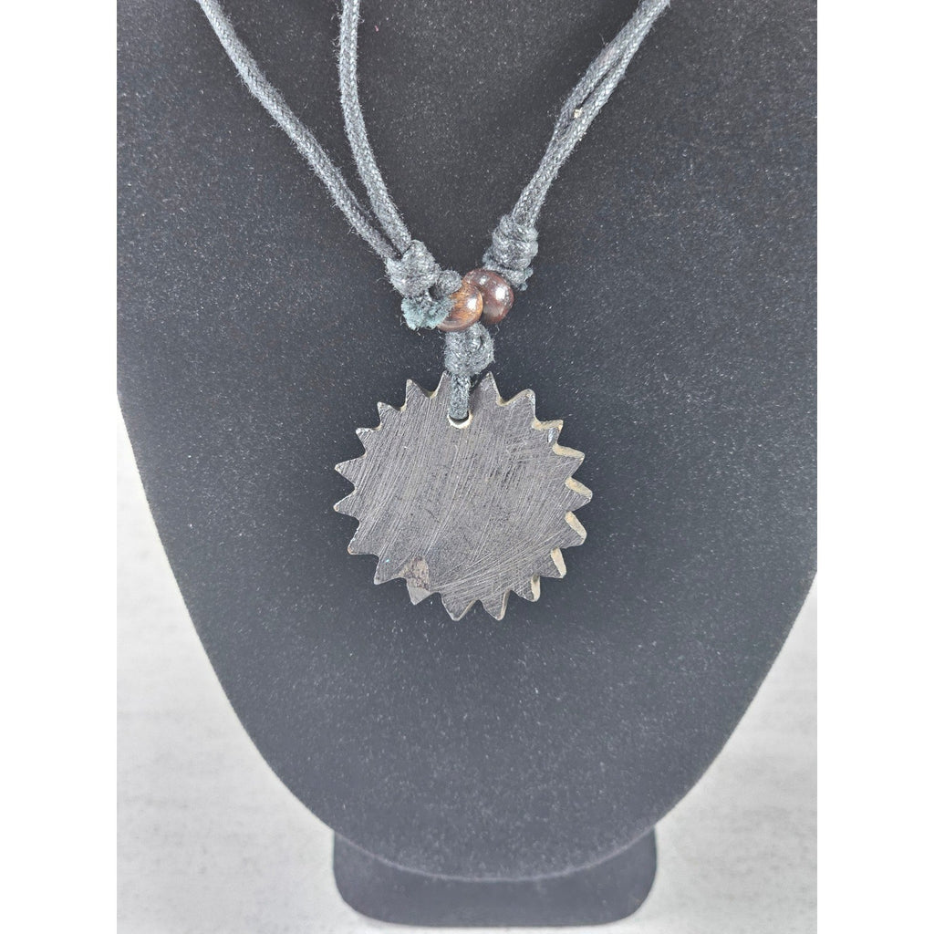 Vintage Carved Black Pendant Necklace Sunburst Lotus Design