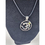 Vintage Sterling Silver Om Pendant with Green Stone Accent