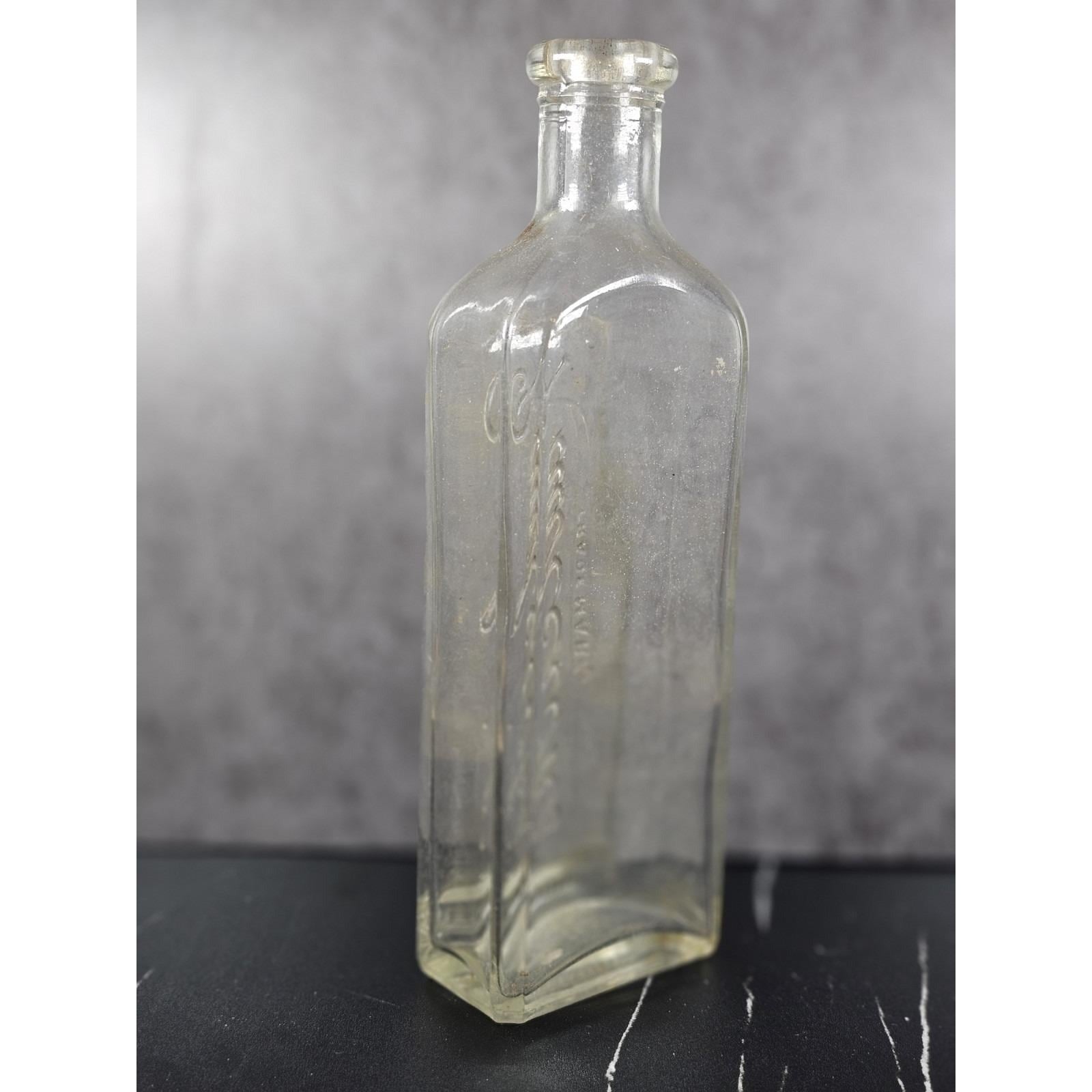 Vintage Rawleighs Embossed Medicine Bottle Clear Glass Apothecary