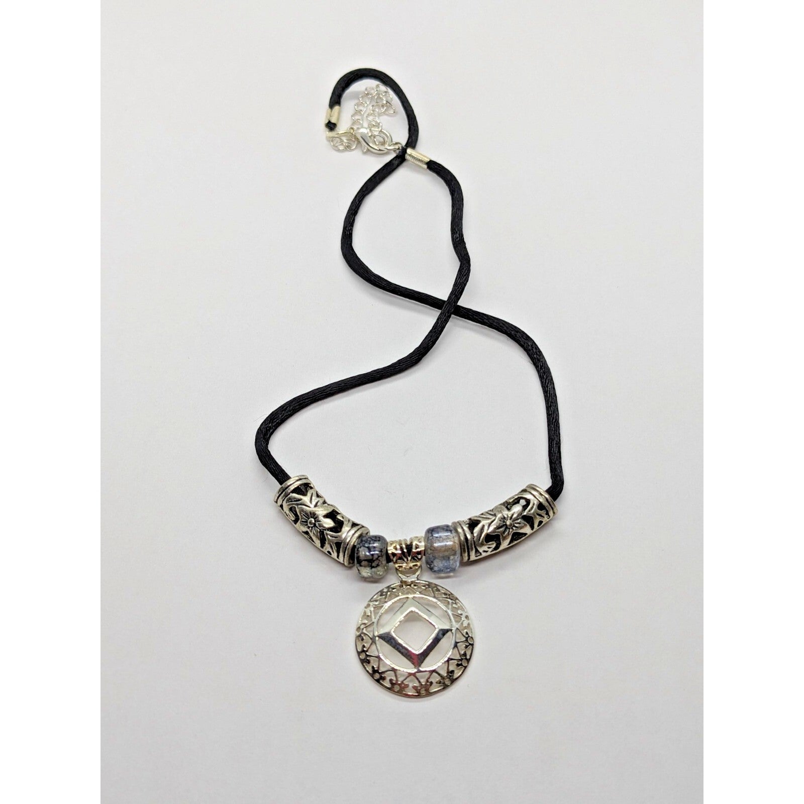 925 Sterling Silver NA Recovery Symbol Necklace on 16 Inch Cord