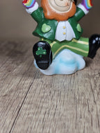 Saint Patricks Day Ceramic Leprechaun Holding Rainbow Figurine