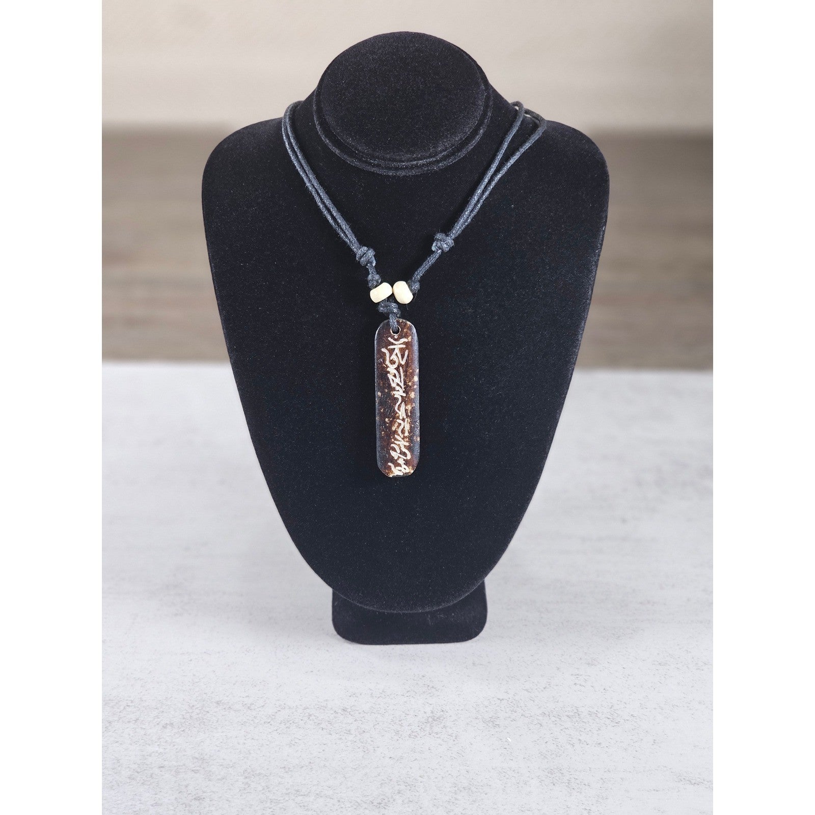 Vintage Carved Script Pendant Necklace Brown Cord