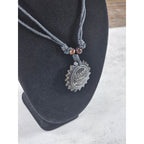 Vintage Carved Black Pendant Necklace Sunburst Lotus Design