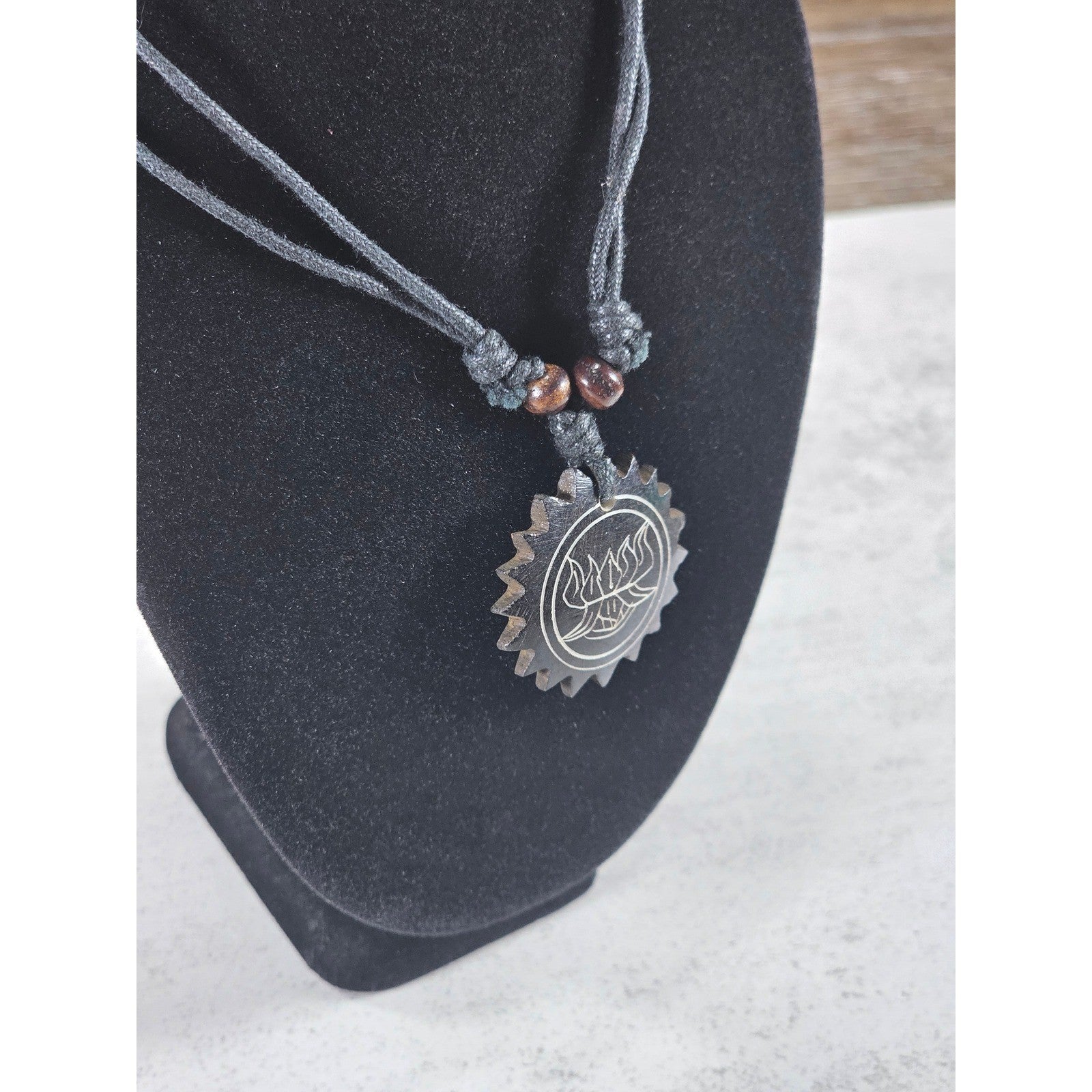 Vintage Carved Black Pendant Necklace Sunburst Lotus Design
