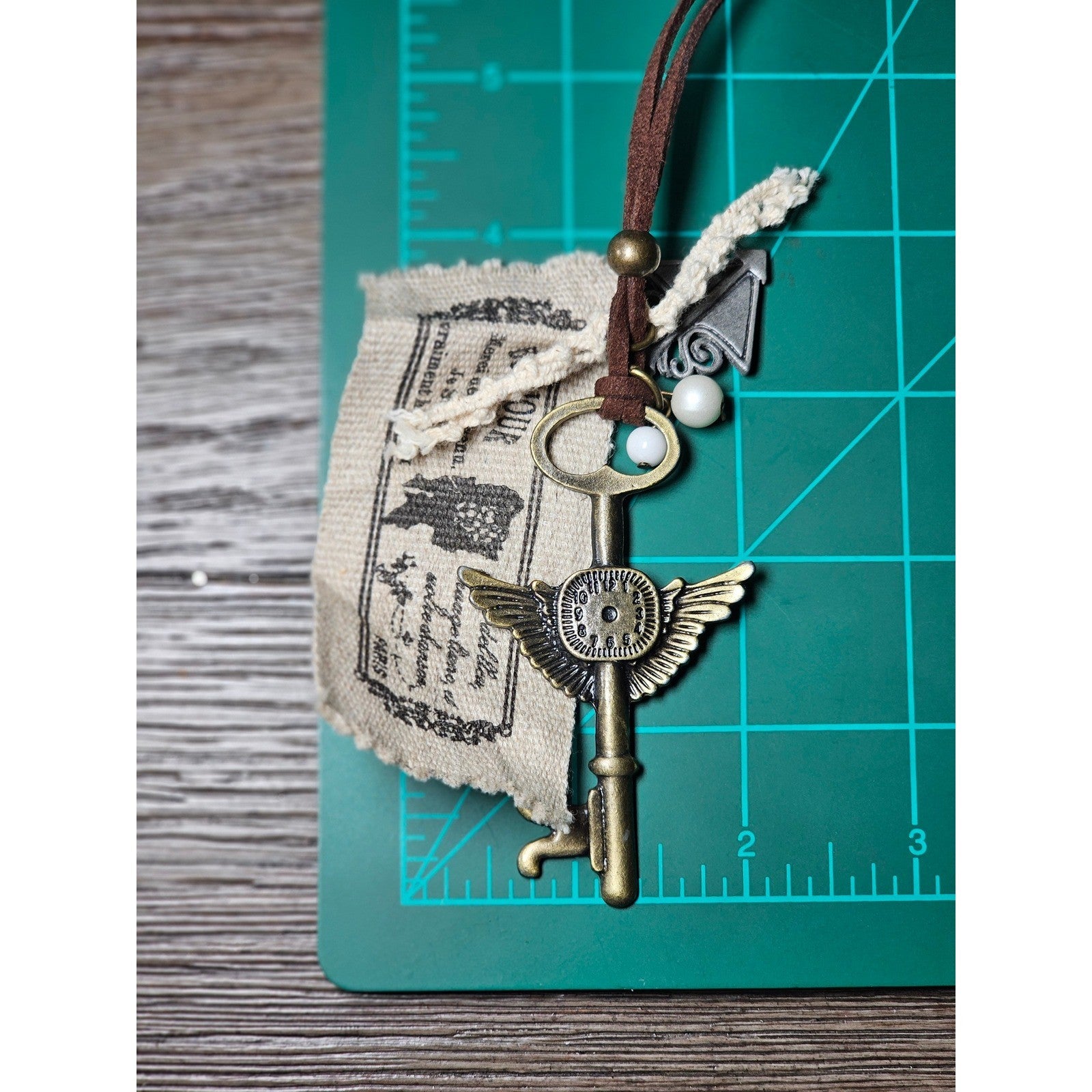 Vintage Style Winged Key Necklace on Suede Cord with Fabric Tag Charms