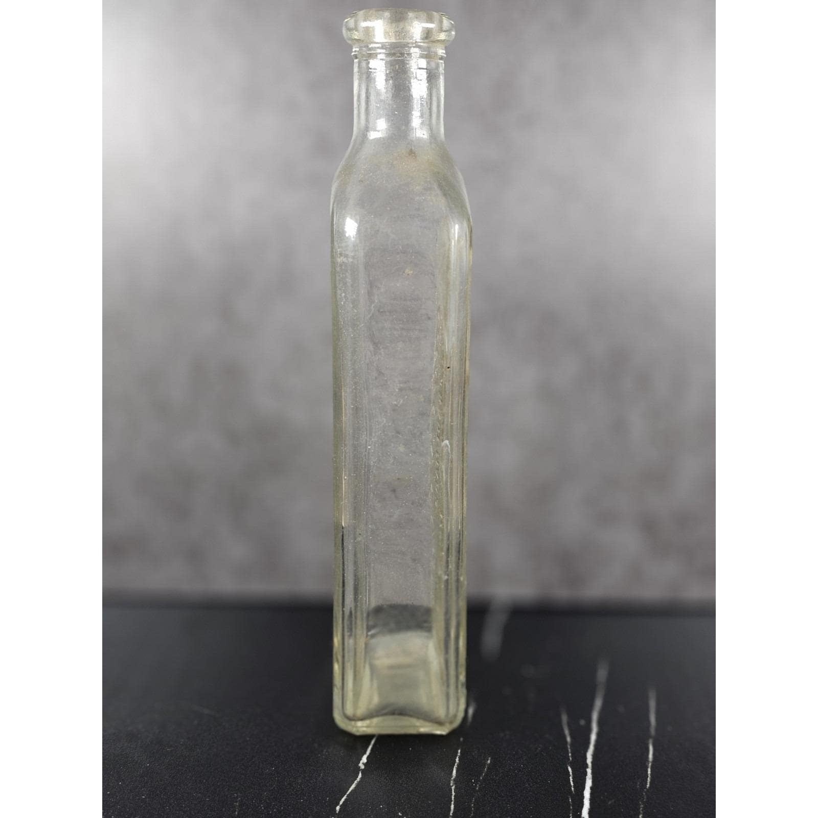 Vintage Rawleighs Embossed Medicine Bottle Clear Glass Apothecary