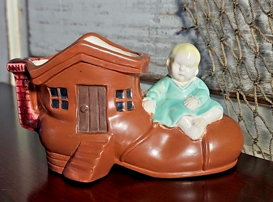 VINTAGE HAND PAINTED PORCELAIN SHOE HOUSE WITH CHILD FIGURINE/ PLANTER - JAPAN