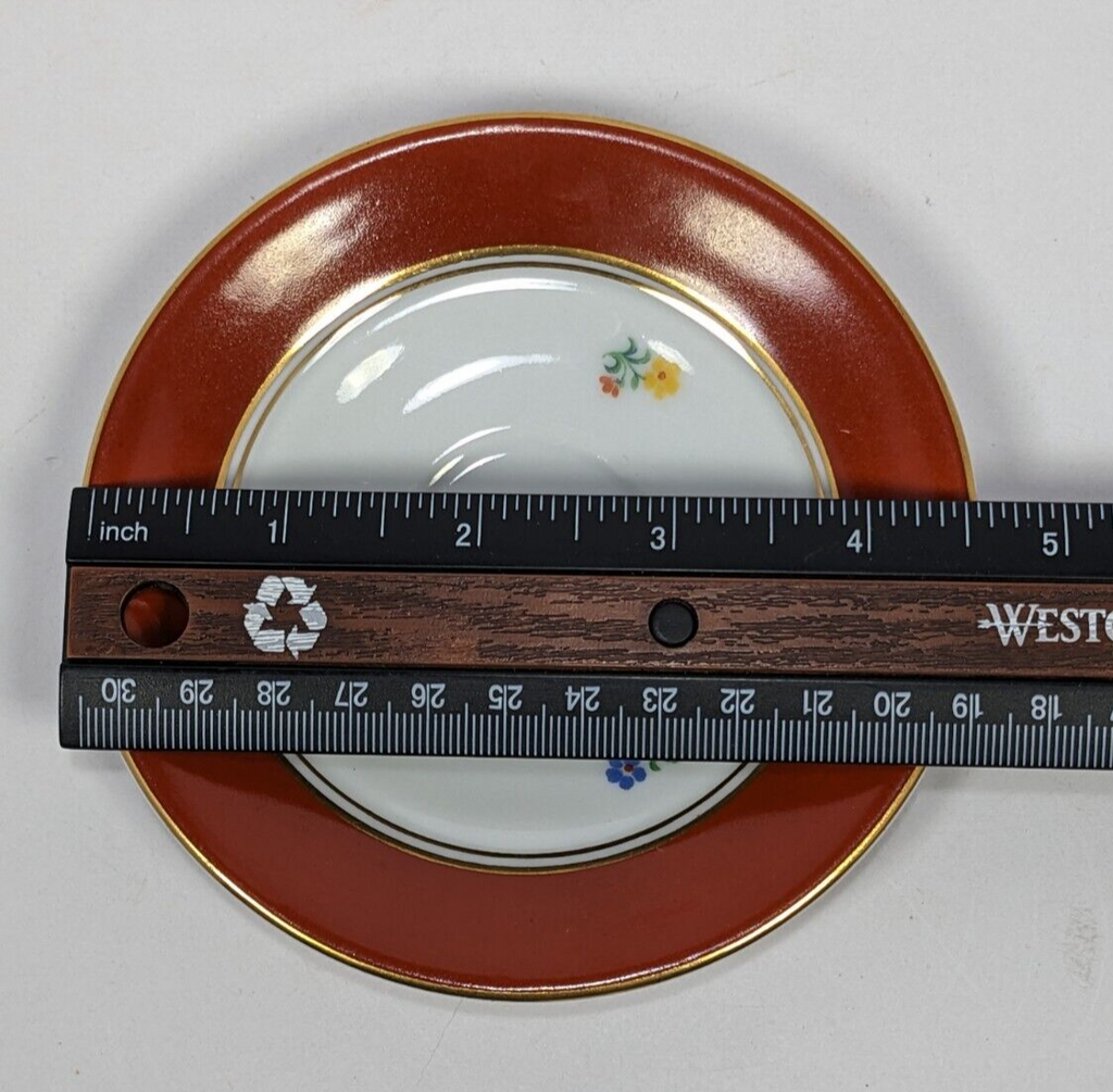 Floral Design Condol Saucer And Tea Cup With Gold Trim