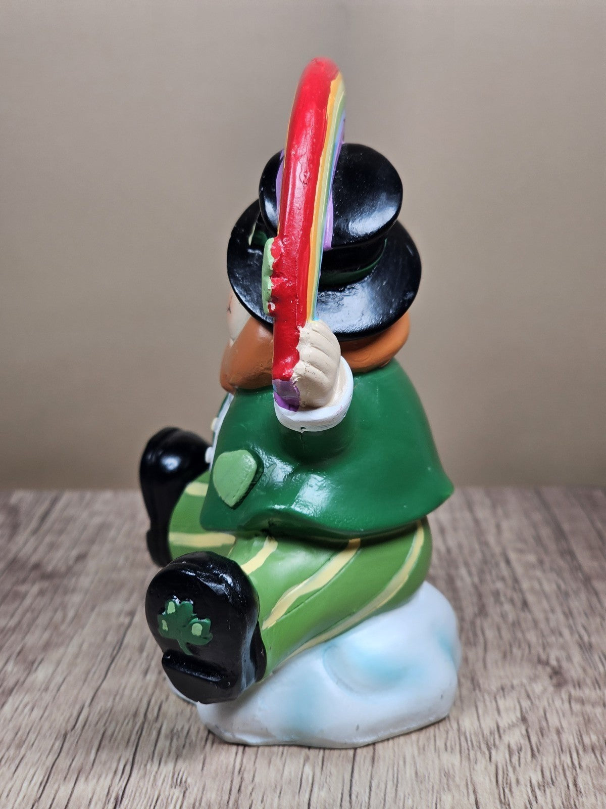 Saint Patricks Day Ceramic Leprechaun Holding Rainbow Figurine