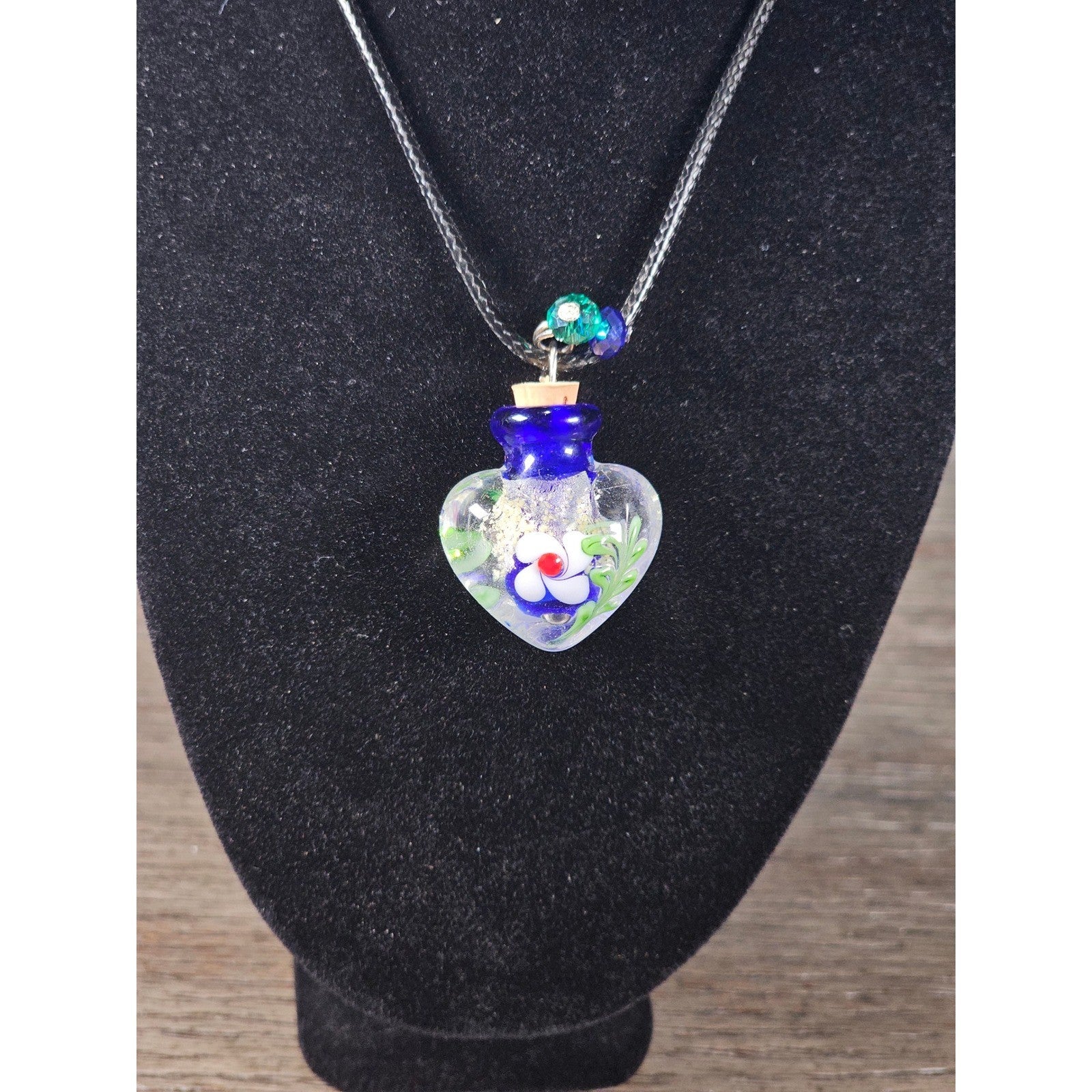 Glass Heart Bottle Pendant Necklace with Floral Design on Black Cord