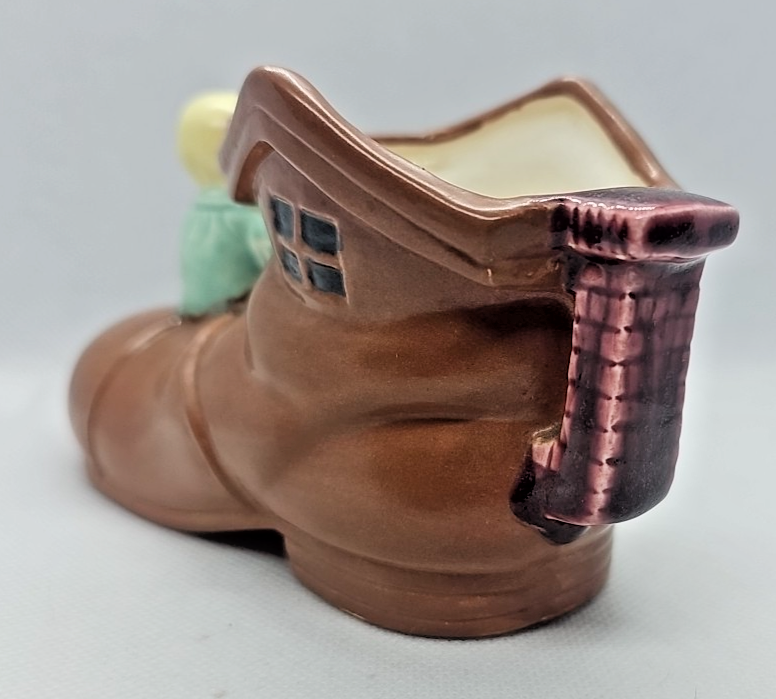 VINTAGE HAND PAINTED PORCELAIN SHOE HOUSE WITH CHILD FIGURINE/ PLANTER - JAPAN