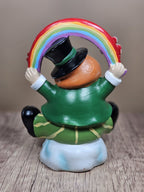 Saint Patricks Day Ceramic Leprechaun Holding Rainbow Figurine