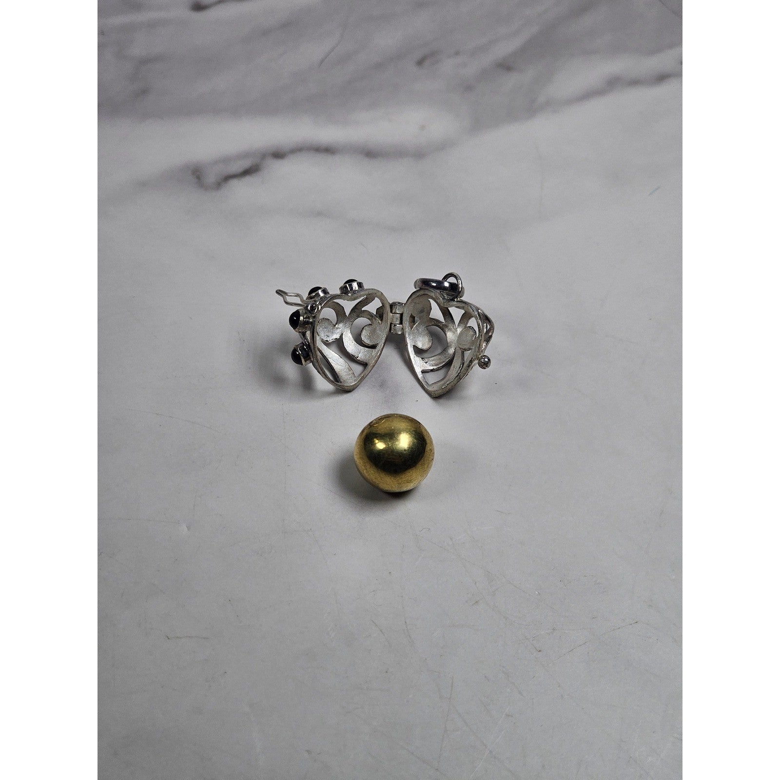 Vintage Hinged Locket Pendant with Inner Sphere & Dark Stone Accents