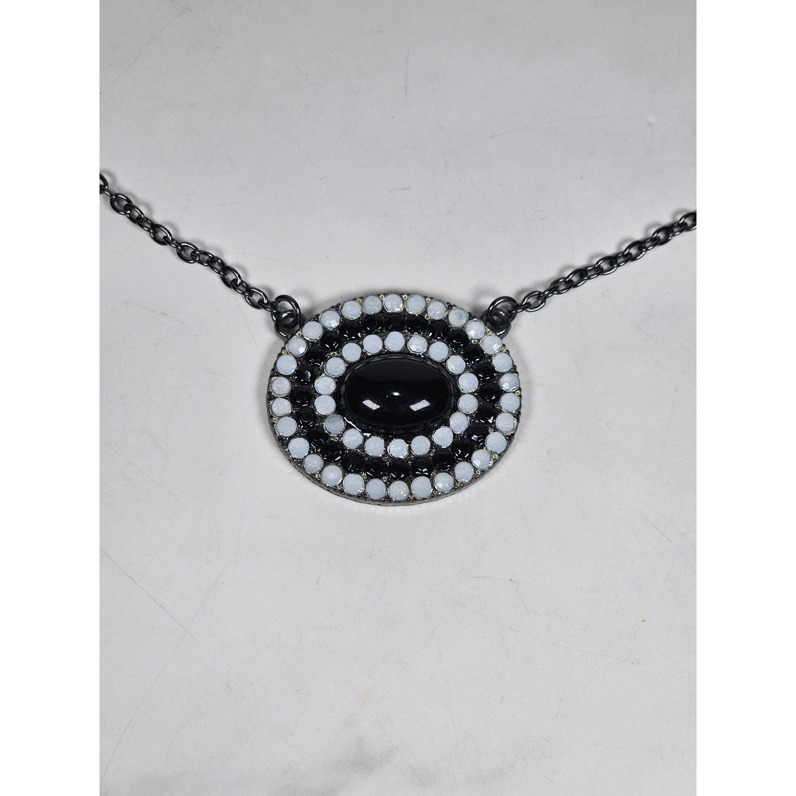Vintage Black Oval Pendant Necklace with Rhinestone Halo on Gunmetal Chain