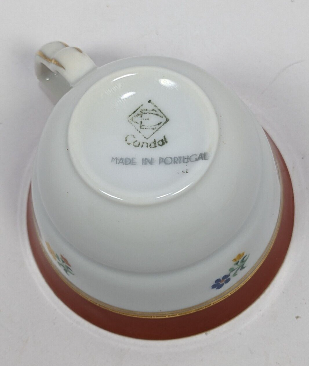 Floral Design Condol Saucer And Tea Cup With Gold Trim