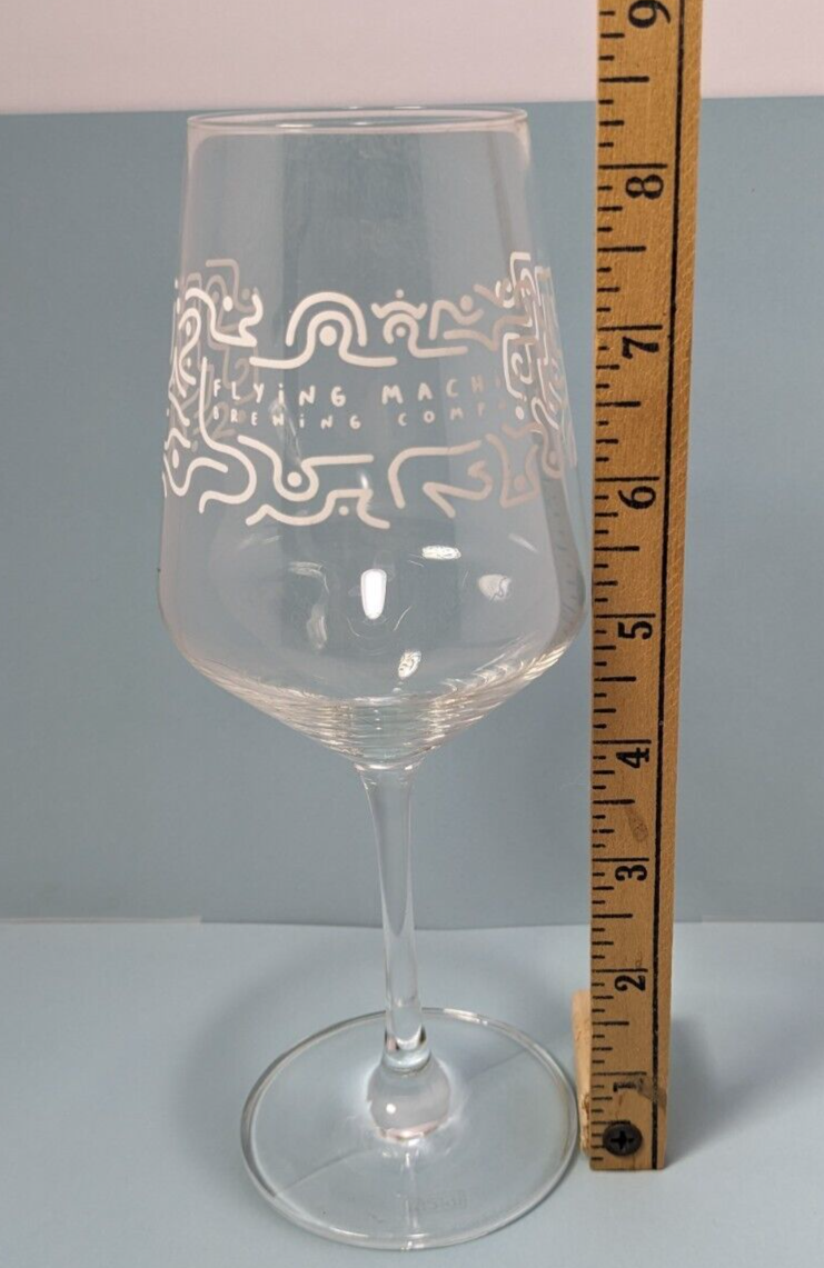 Flying Machine Brewing Company Wine Glass With Abstract Design