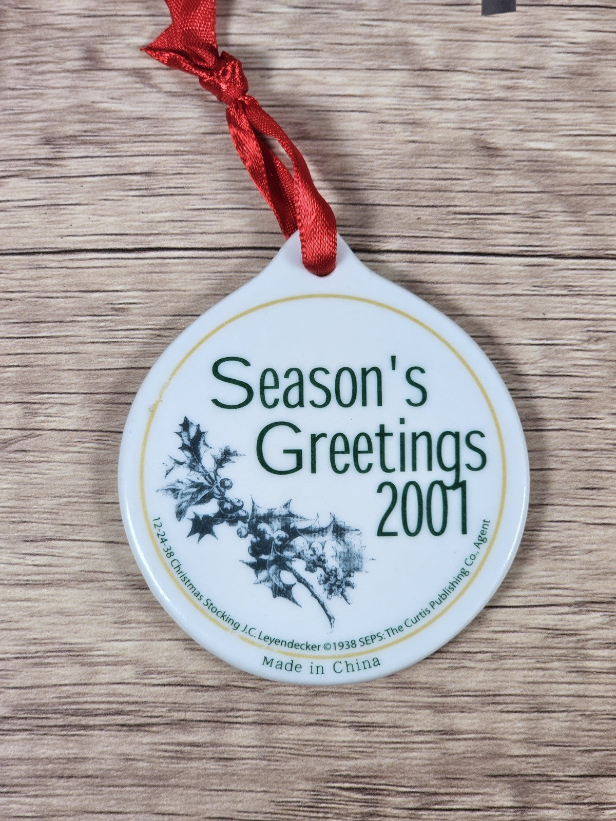 Vintage J.C. Leyendecker Seasons Greeting 2001 Christmas Porcelain Ornament