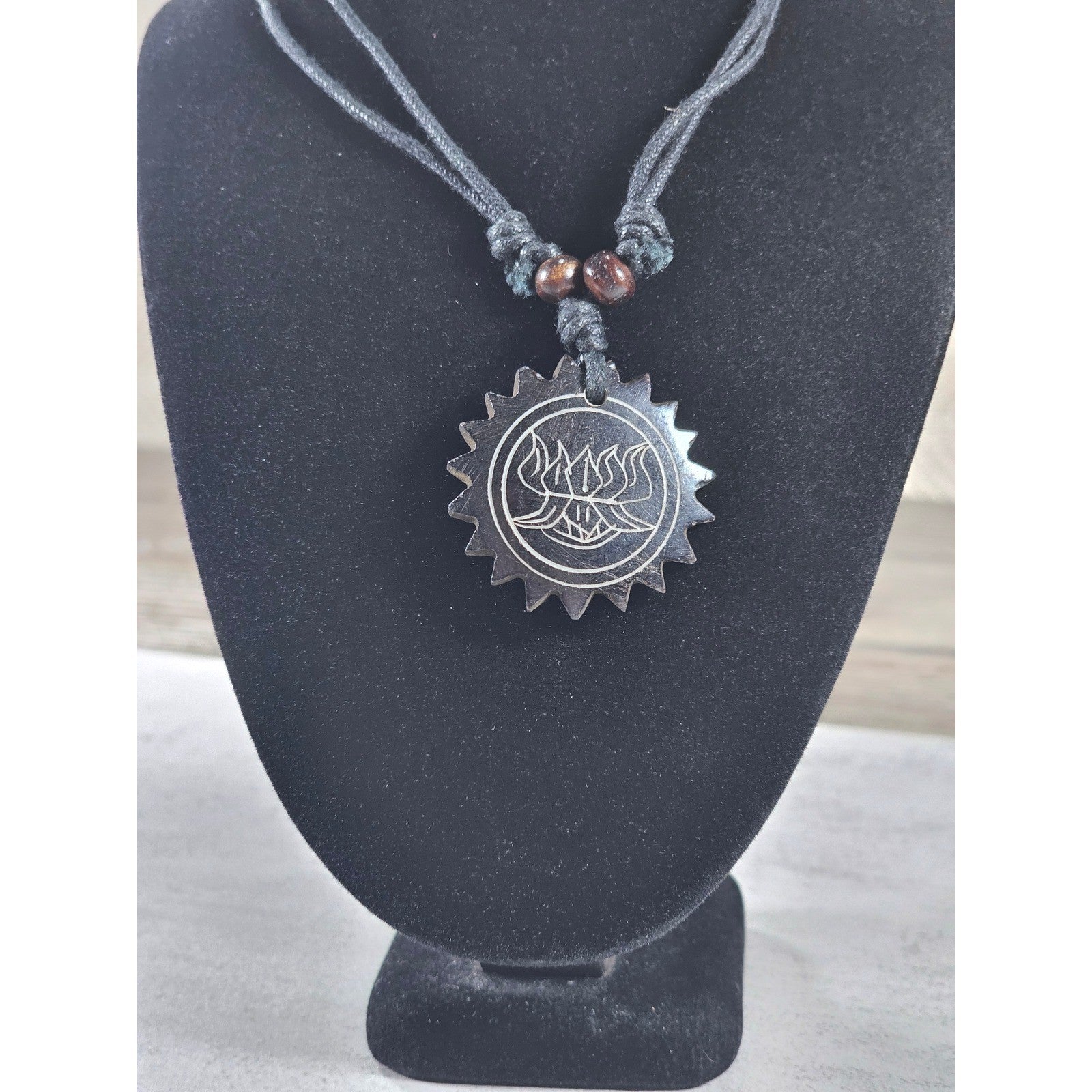 Vintage Carved Black Pendant Necklace Sunburst Lotus Design